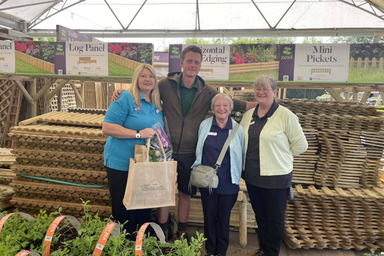 Sharon Dewsbury, Activities Co-ordinator and Phil Brown, Dobbies Garden Centre, with Paternoster House volunteers Daphne and Carol Smith