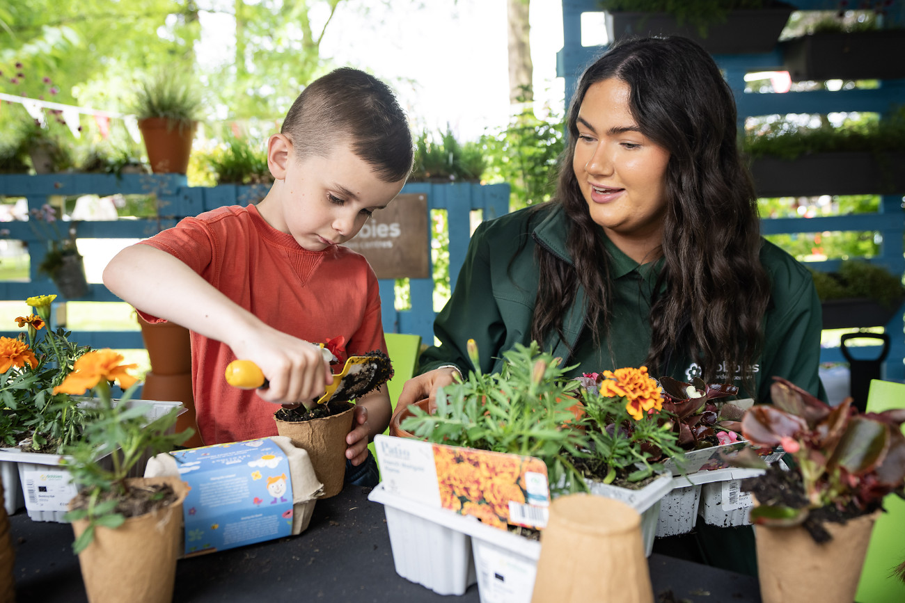 Hannah McAtamney from Dobbies Antrim with Ronan (7) at a recent Little Seedlings Club session - Photo Brian Morrison